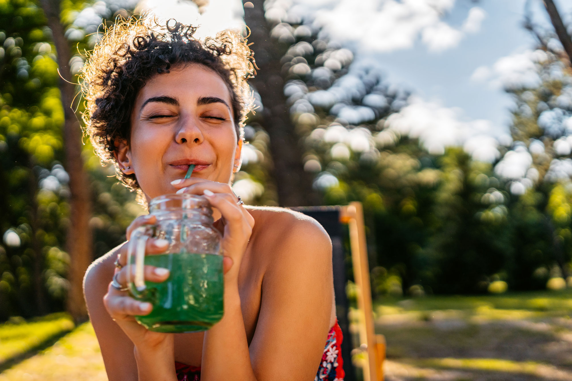Woman drinking health green drink