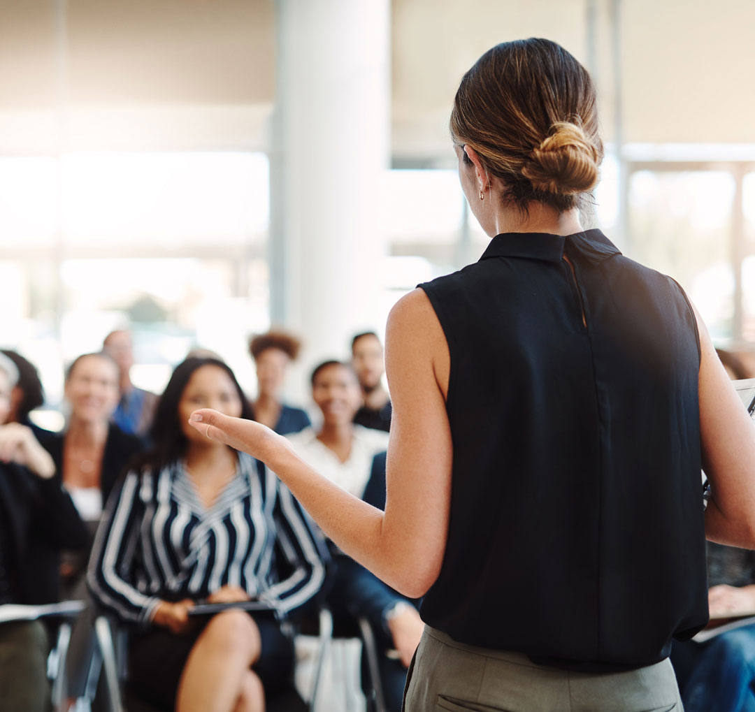 Female Dr speaking at a Fertility Information Seminar