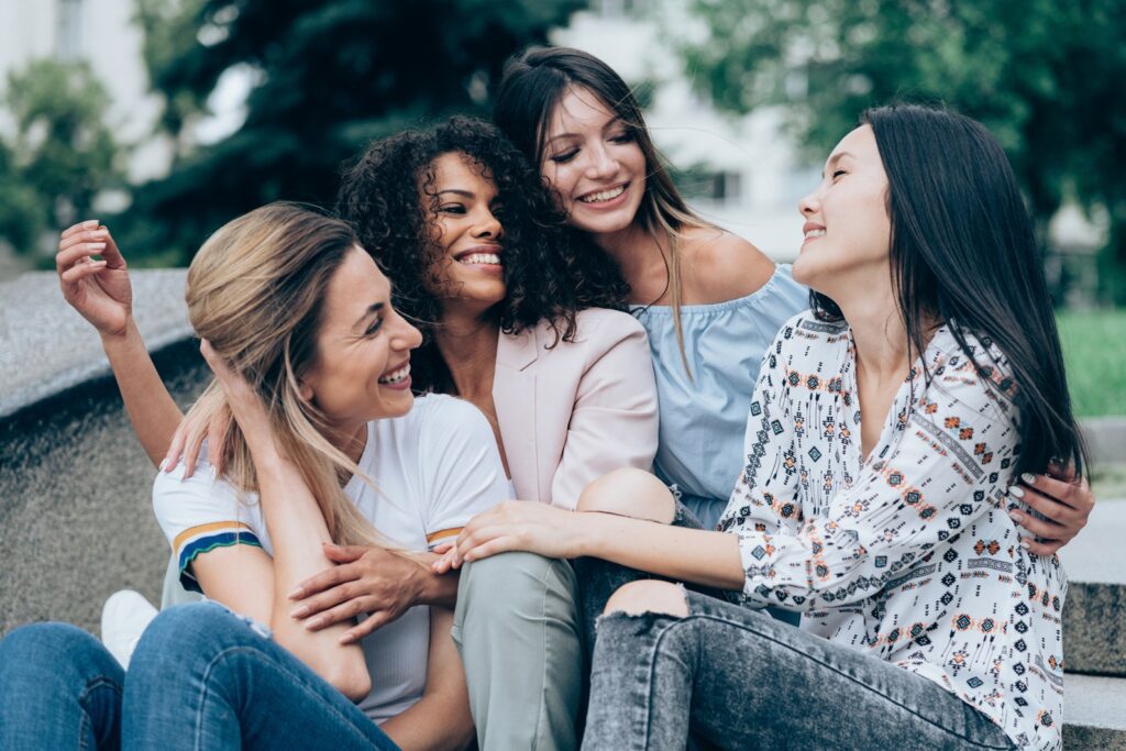 Egg freezing age 
limit - image of Best friends chatting and laughing and have fun together outdoor